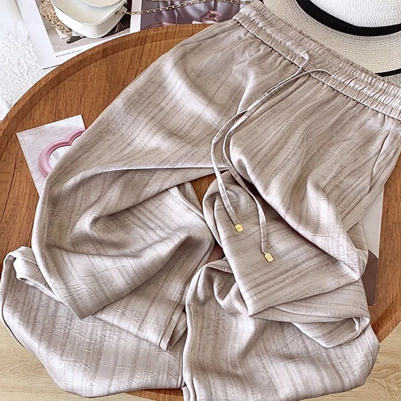 Femmes Jambe large Chinos Vacances Streetwear Basique Longueur complète Taille moyenne Couleur Unie Cordon de serrage Avec Poches Confortable Micro-Élastique Quotidien Extérieur Rue Noir Blanche Kaki de 2026 ? $37.99 –P1