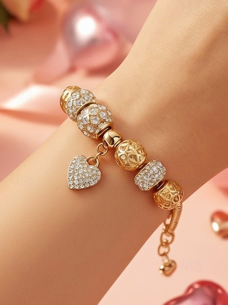 Dámský náramek s přívěskem ve tvaru srdce z lehké slitiny s třpytivými kubickými zirkony, ideální jako dárek k Valentýnu nebo pro každodenní nošení. 2026 - $11.99 –P1