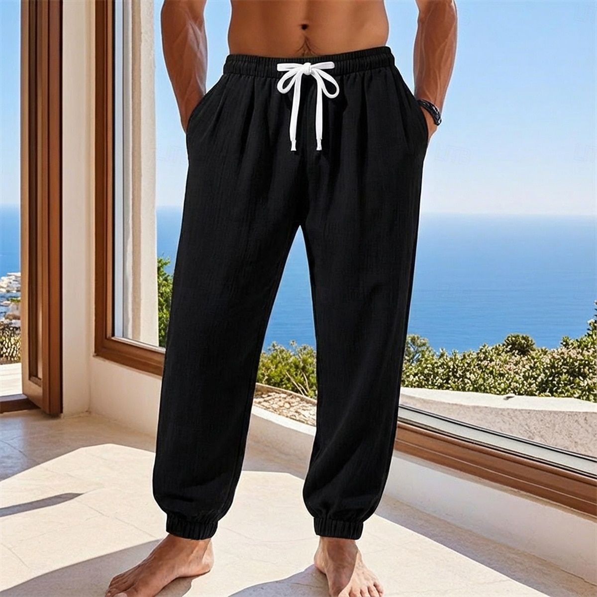Homme Joggeurs Pantalons en Lin Pantalons Pantalon d'été Pantalons Amples Cordon de serrage Taille Élastique Uni Confort Léger Longueur complète Quotidien Plage Fête Vacances Mode Noir Blanche Non de 2026 ? $25.99 –P10