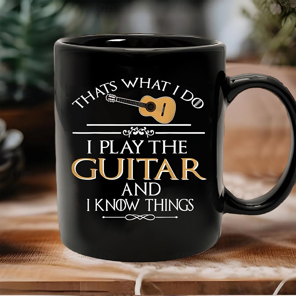 hauska lahjamuki, sitä minä teen, soitan kitaraa ja tiedän asioita, musta keraaminen kahvimuki, humoristinen musiikin ystävän kuppi, lahja kitaristeille, muusikoille, bändin jäsenille ja rock-faneille 2026 - $16.99 –P4