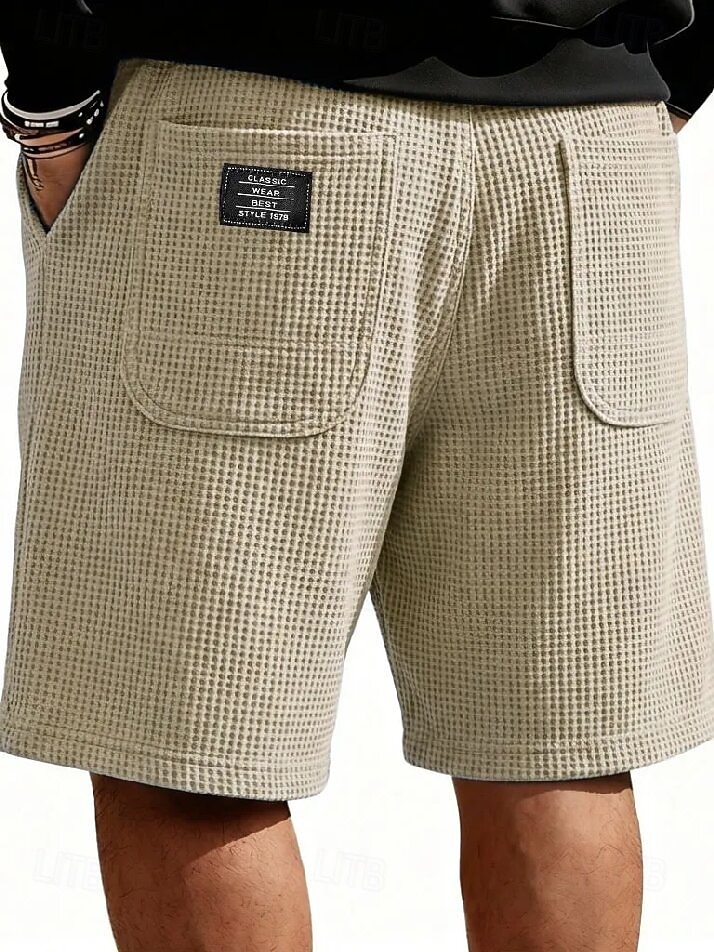 Homme Gauffré Shorts d'été Shorts de plage Cordon de serrage Taille Élastique Jambe Droite Uni Confort Doux Longueur Genou Quotidien Plage Mode Chic & Moderne bleu marine Non Elastique de 2026 ? $22.99 –P7