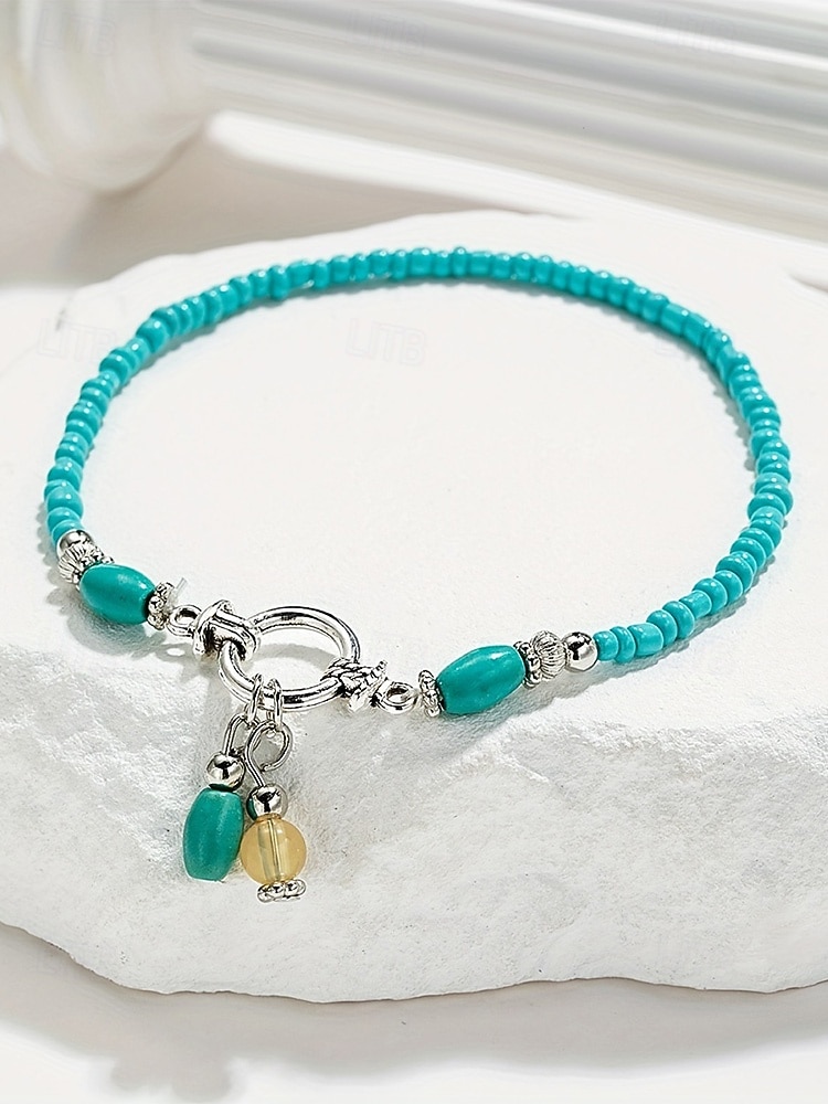 Pulseira de tornozelo feminina estilo boêmio com miçangas coloridas de resina e pingente charmoso. Leve e prática, ideal para usar no dia a dia, em férias, resorts e no verão. de 2026 por $7.99 –P6