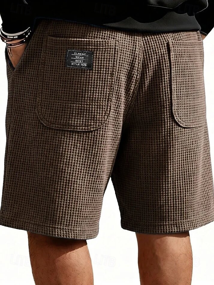 Homme Gauffré Shorts d'été Shorts de plage Cordon de serrage Taille Élastique Jambe Droite Uni Confort Doux Longueur Genou Quotidien Plage Mode Chic & Moderne bleu marine Non Elastique de 2026 ? $22.99 –P8