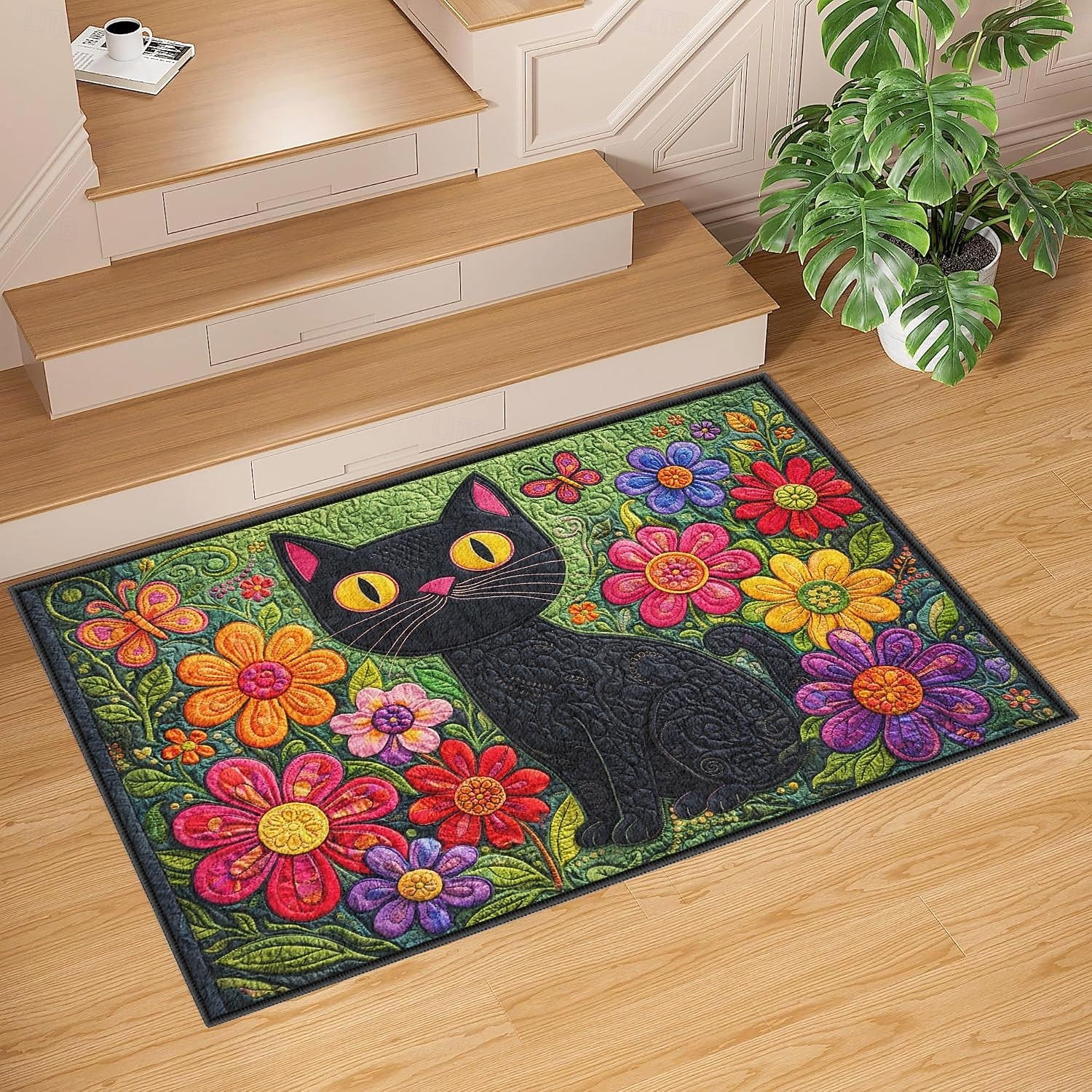zerbino finto ricamato con elegante gatto nero circondato da un colorato giardino fiorito del 2026 a $13.49 –P2
