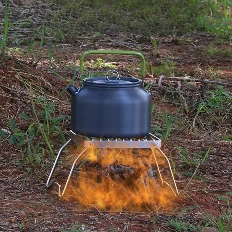 Opvouwbare roestvrijstalen vuurkorfstandaard voor buiten, beschermt voedsel tegen direct contact, geschikt voor kamperen, barbecueën, koken en verwarmen. Een essentieel accessoire voor buitenkoken. 2026 - $15.99 –P3