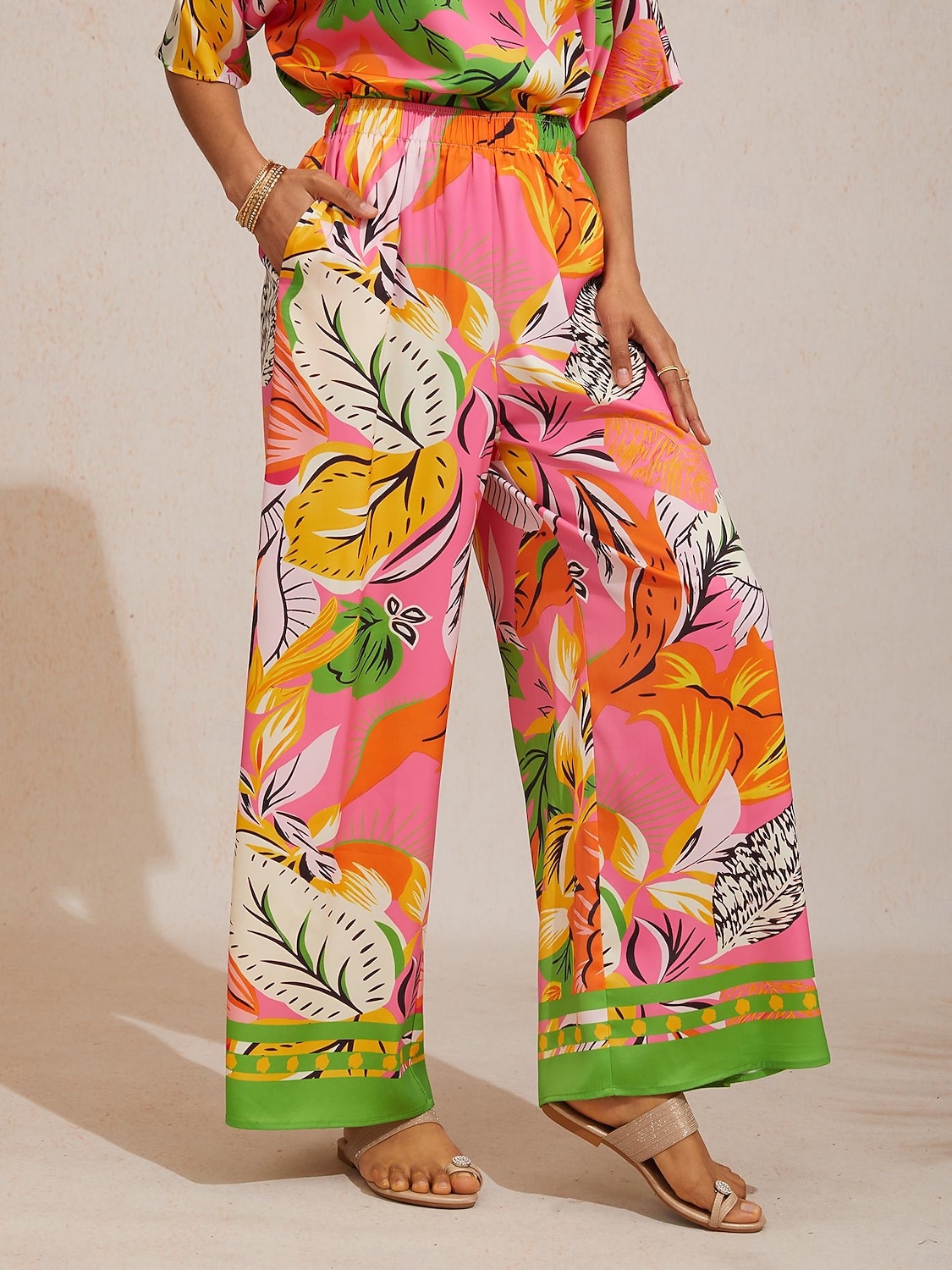 Dzikie satynowe spodnie z szerokimi nogawkami w kształcie hibiskusa 2026 - R$451.26 –P1