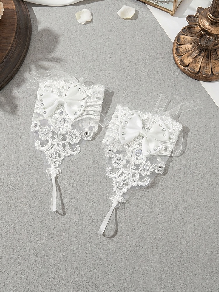 Luvas femininas de renda até o pulso, confeccionadas em poliéster, um elegante acessório para noivas, ideal para casamentos, festas e ocasiões especiais. de 2026 por CLP $10028 –P5