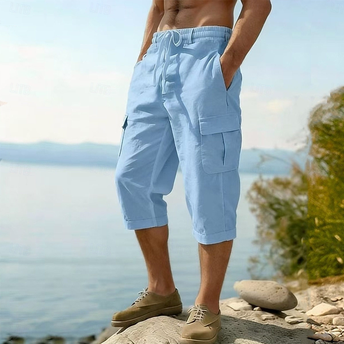 Homme Pantalons en Lin Pantalon capri Pantalon d'été Cordon de serrage Taille Élastique Multi-poches Uni Confort Respirant Longueur mollet Occasionnel Quotidien Extérieur Vacances Mode Bleu Noir Non de 2026 ? $24.99 –P1