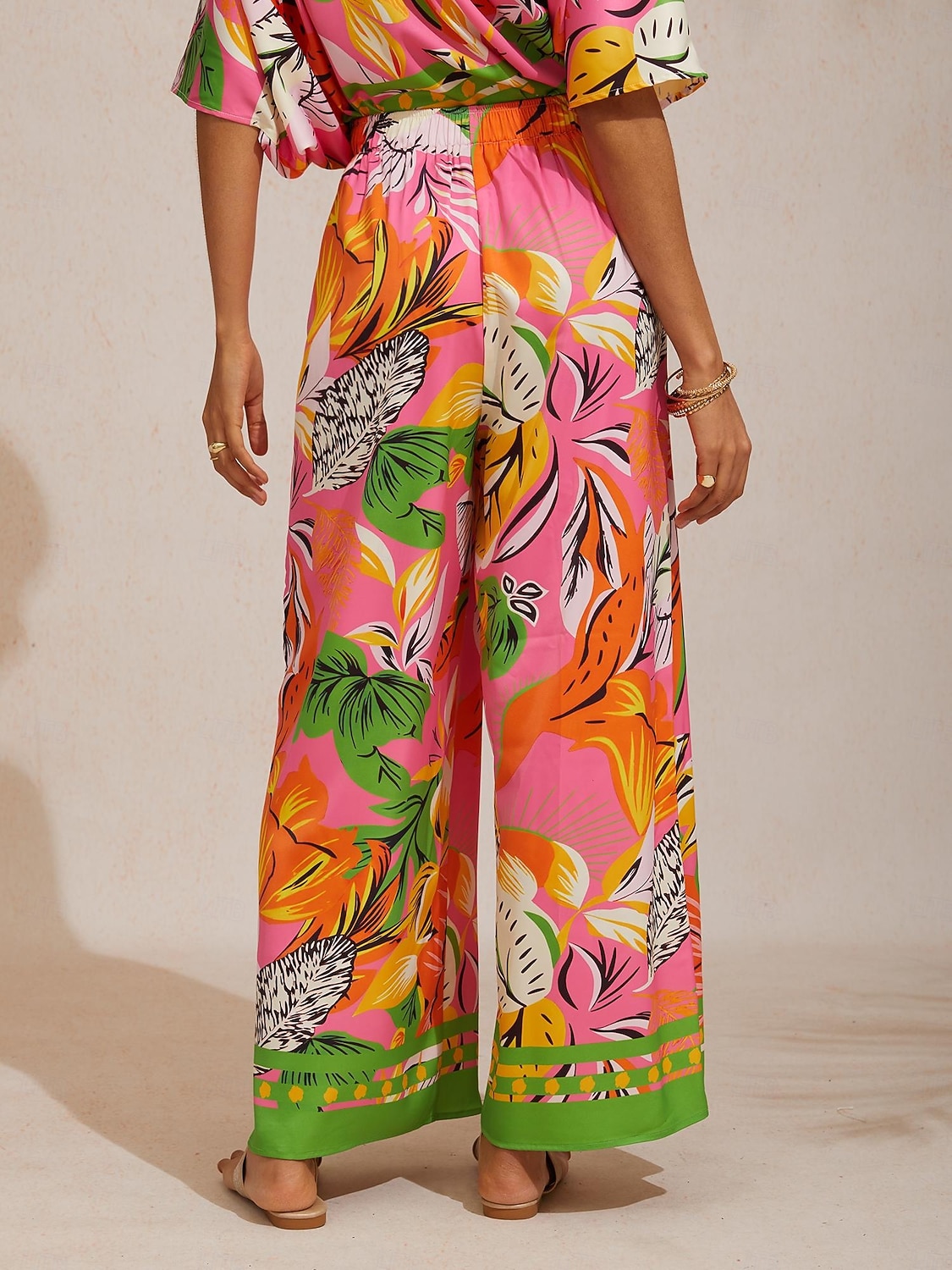 Dzikie satynowe spodnie z szerokimi nogawkami w kształcie hibiskusa 2026 - R$451.26 –P5