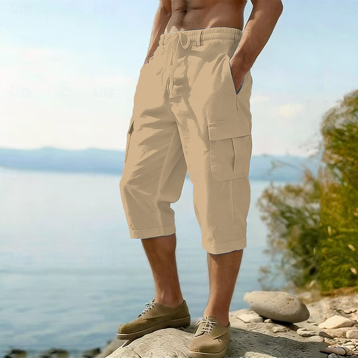 Homme Pantalons en Lin Pantalon capri Pantalon d'été Cordon de serrage Taille Élastique Multi-poches Uni Confort Respirant Longueur mollet Occasionnel Quotidien Extérieur Vacances Mode Bleu Noir Non de 2026 ? $24.99 –P5