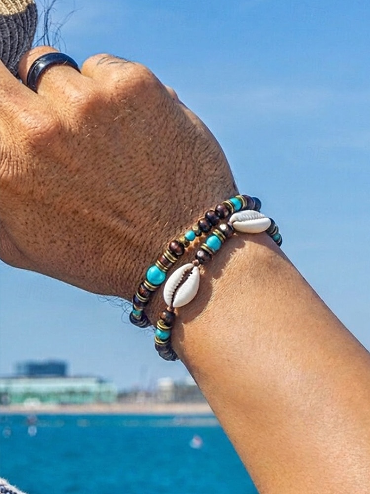 Set di due bracciali da uomo in stile boho, con perline di legno, turchese e conchiglia, perfetti per le vacanze al mare e per uno stile casual quotidiano. del 2026 a $7.99 –P4