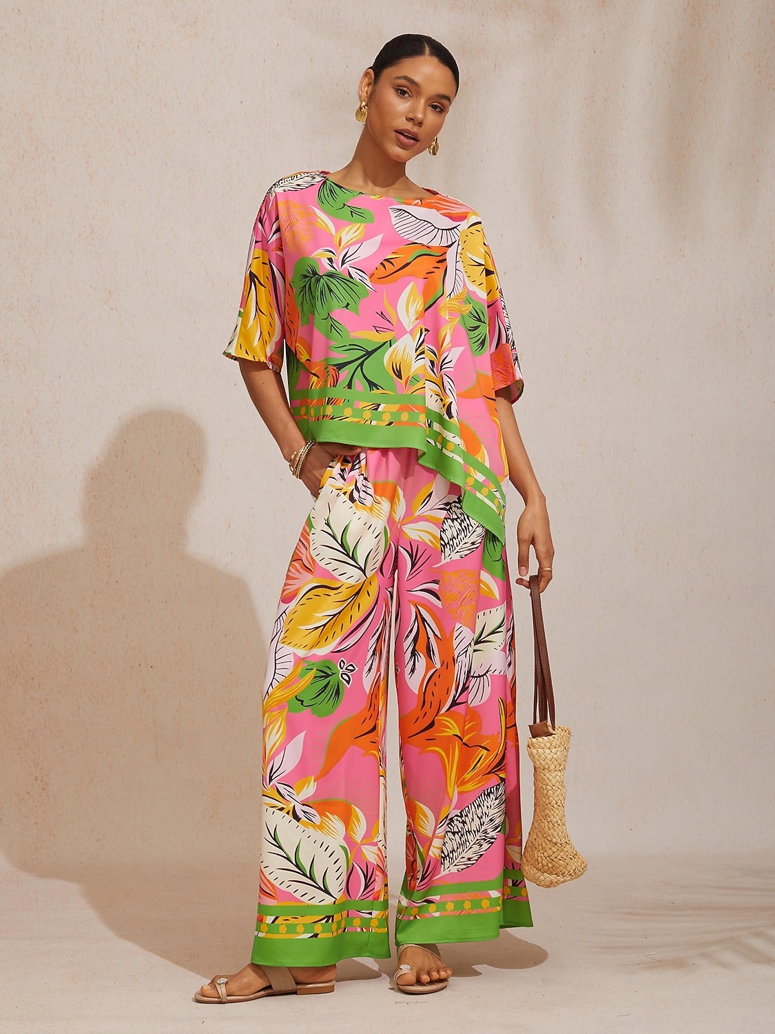 Dzikie satynowe spodnie z szerokimi nogawkami w kształcie hibiskusa 2026 - R$451.26 –P6