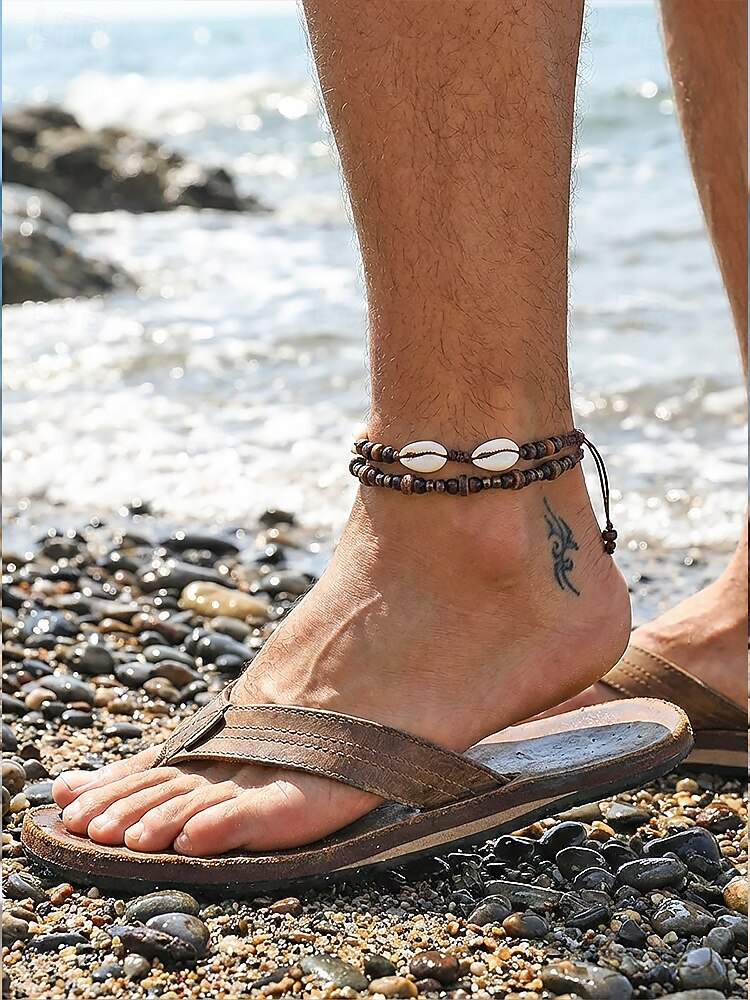 Pánská sada bohémských náramků na kotník z mušlí cowrie a dřevěných korálků, 2 ks ručně vyráběných kmenových nastavitelných šperků na nohy pro letní dovolenou u pláže a každodenní nošení. 2026 - $7.99 –P1