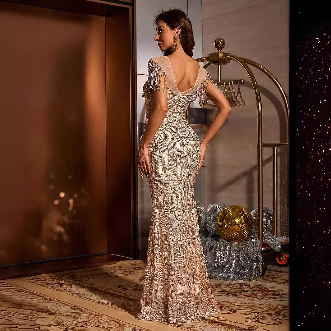 roaring 20s formal dress A 1920s Fashion History Lesson: Flappers, the Bob, and More Trends perfect for Great Gatsby Parties Roaring 20s 1920s Long Length