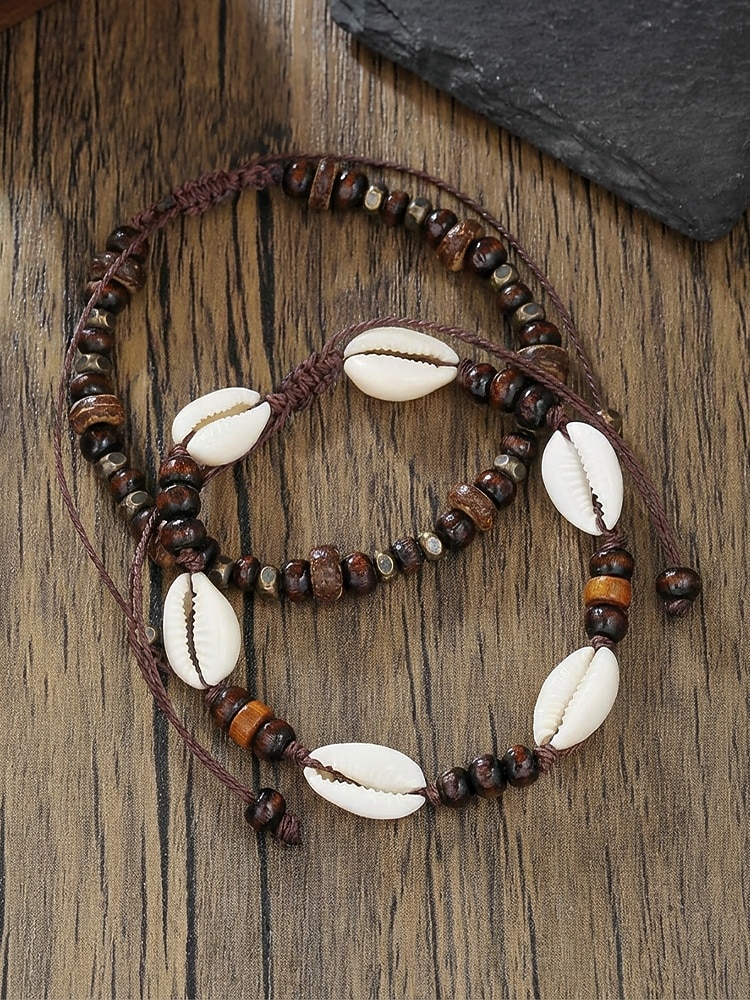 Pánská sada bohémských náramků na kotník z mušlí cowrie a dřevěných korálků, 2 ks ručně vyráběných kmenových nastavitelných šperků na nohy pro letní dovolenou u pláže a každodenní nošení. 2026 - $7.99 –P5