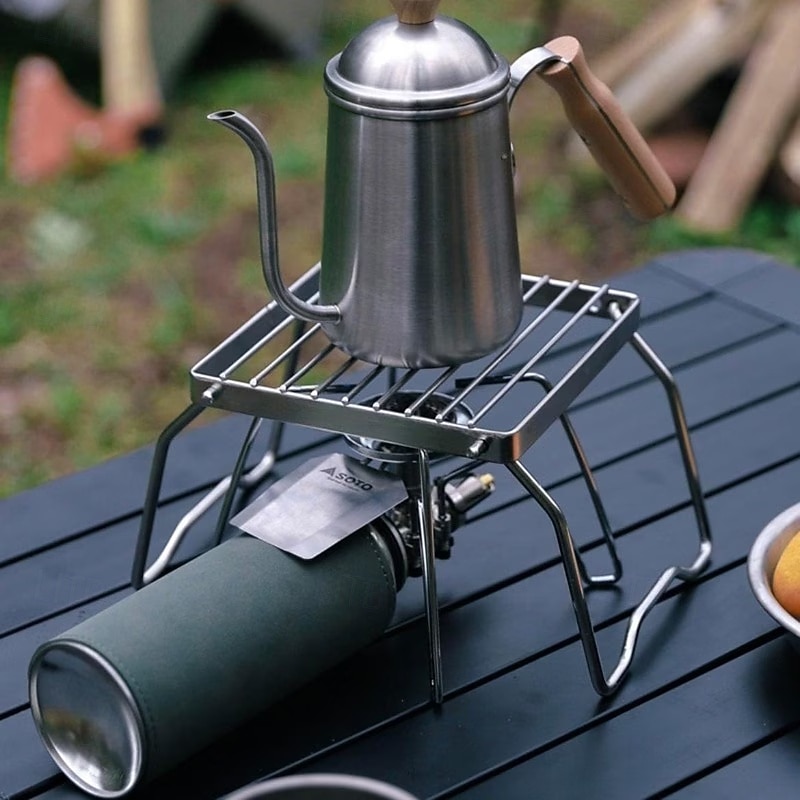 Opvouwbare roestvrijstalen vuurkorfstandaard voor buiten, beschermt voedsel tegen direct contact, geschikt voor kamperen, barbecueën, koken en verwarmen. Een essentieel accessoire voor buitenkoken. 2026 - $15.99 –P1