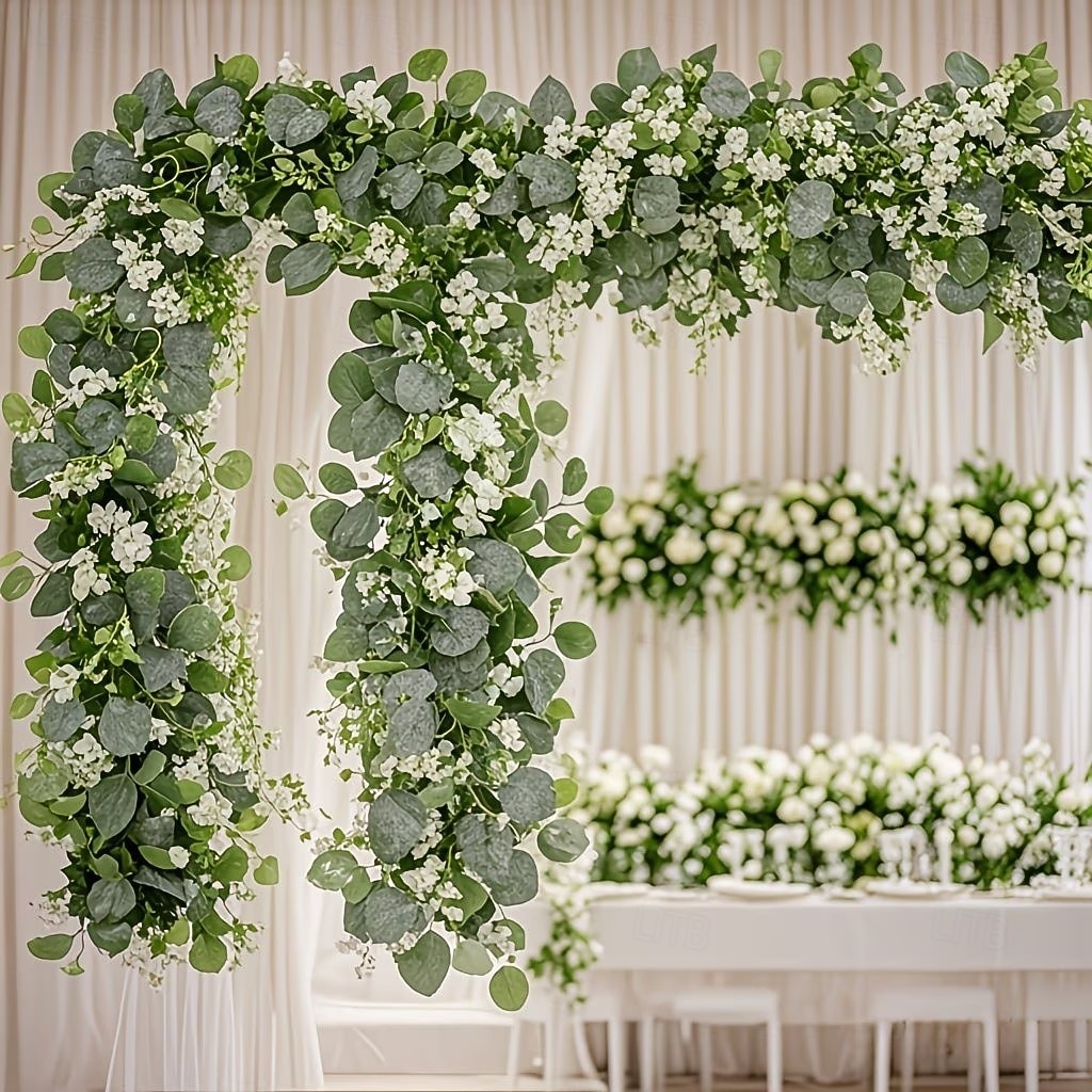 Conjunto de 2/4 guirlandas de eucalipto, com comprimento total de 141,73 polegadas (360 cm), adornadas com flores brancas, folhas prateadas e folhagens realistas, ideais para decoração de casamentos e de 2026 por $16.99 –P5