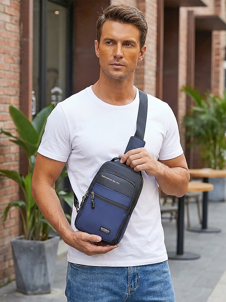 Borsa a tracolla da uomo in poliestere, zaino a tracolla di grande capacità multicolore con tracolla regolabile e design multi-tasca, ideale per viaggi, tempo libero all'aperto e uso quotidiano. del 2026 a $14.99 –P1