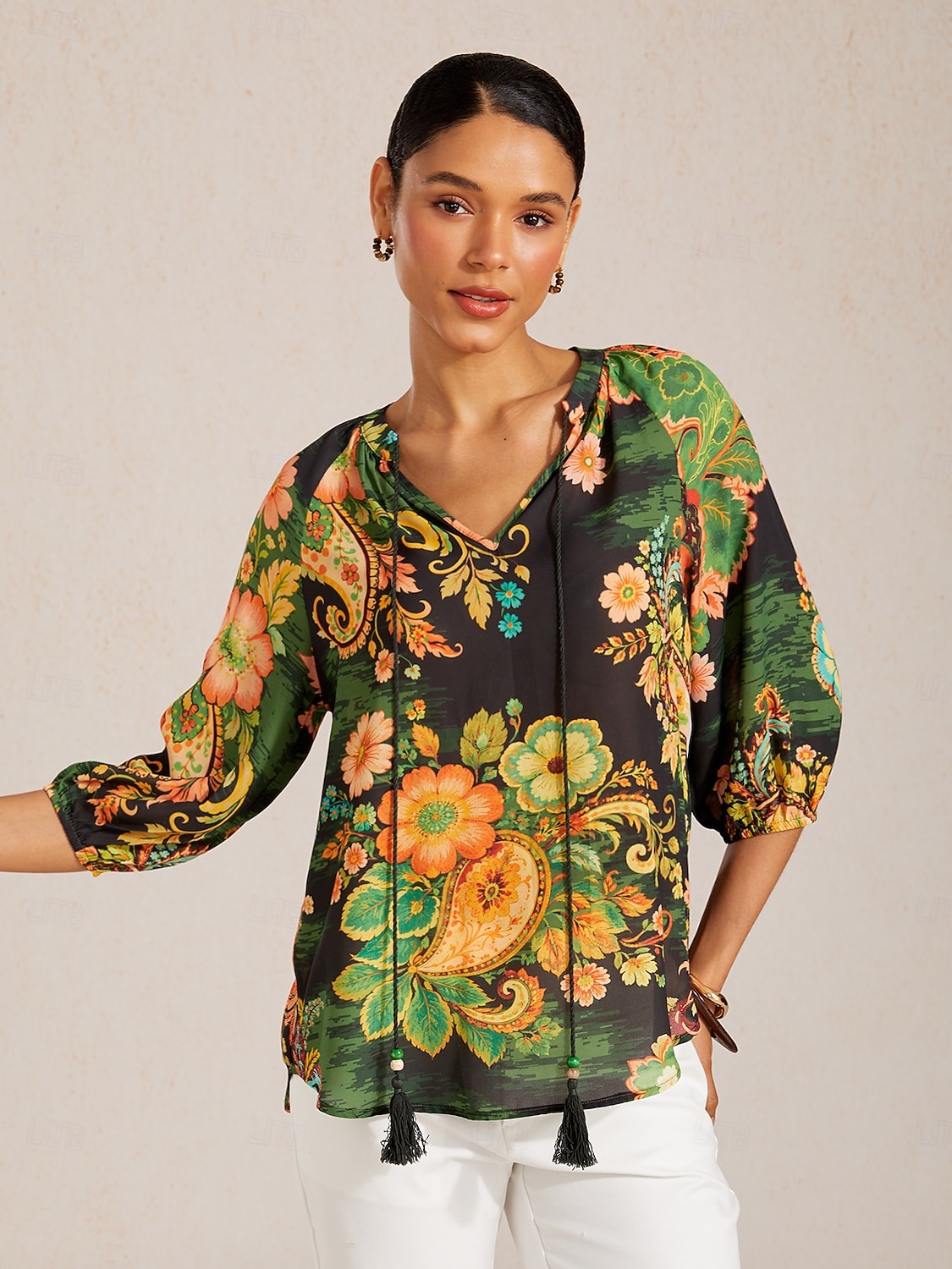 Top de gasa fluida con mangas raglán y estampado paisley. 2026 - $67.99 –P1