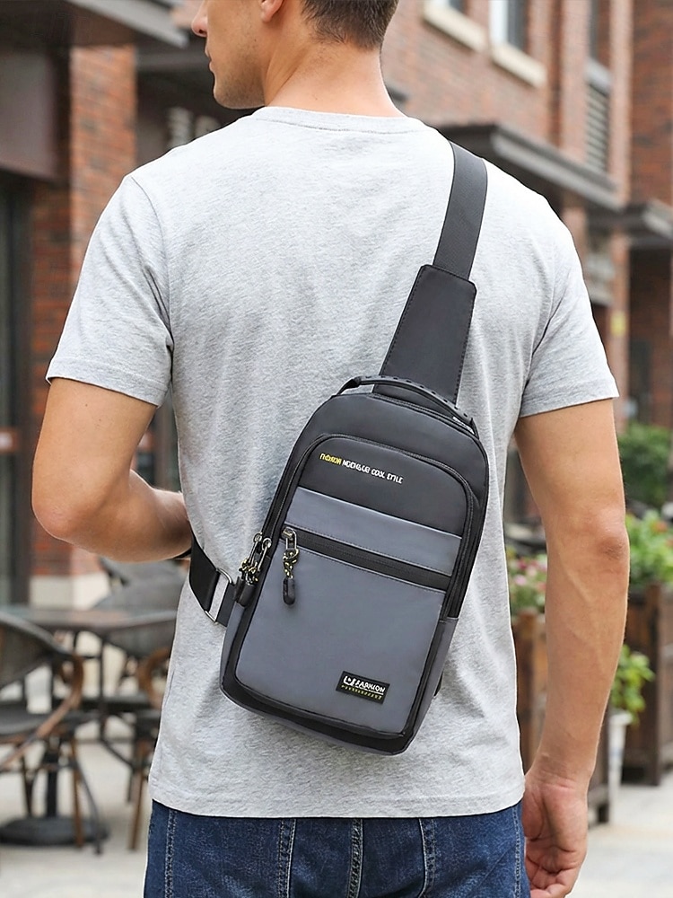 Borsa a tracolla da uomo in poliestere, zaino a tracolla di grande capacità multicolore con tracolla regolabile e design multi-tasca, ideale per viaggi, tempo libero all'aperto e uso quotidiano. del 2026 a $14.99 –P3