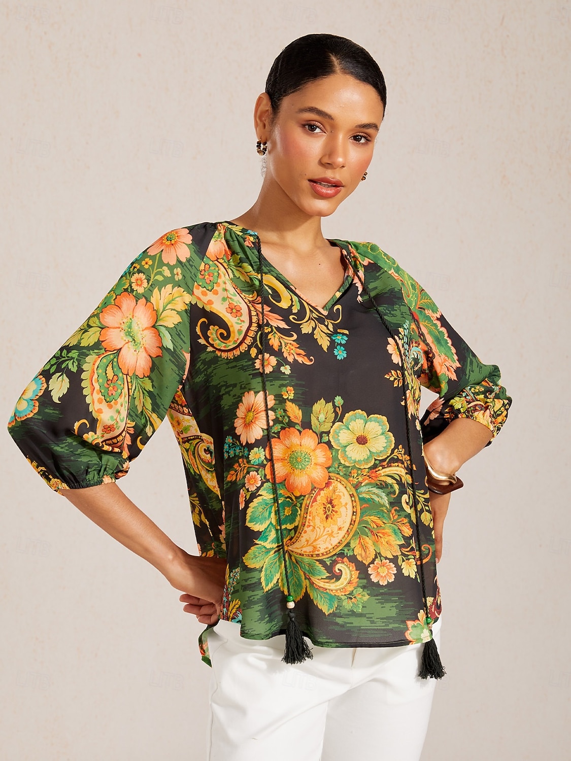 Top de gasa fluida con mangas raglán y estampado paisley. 2026 - $67.99 –P9