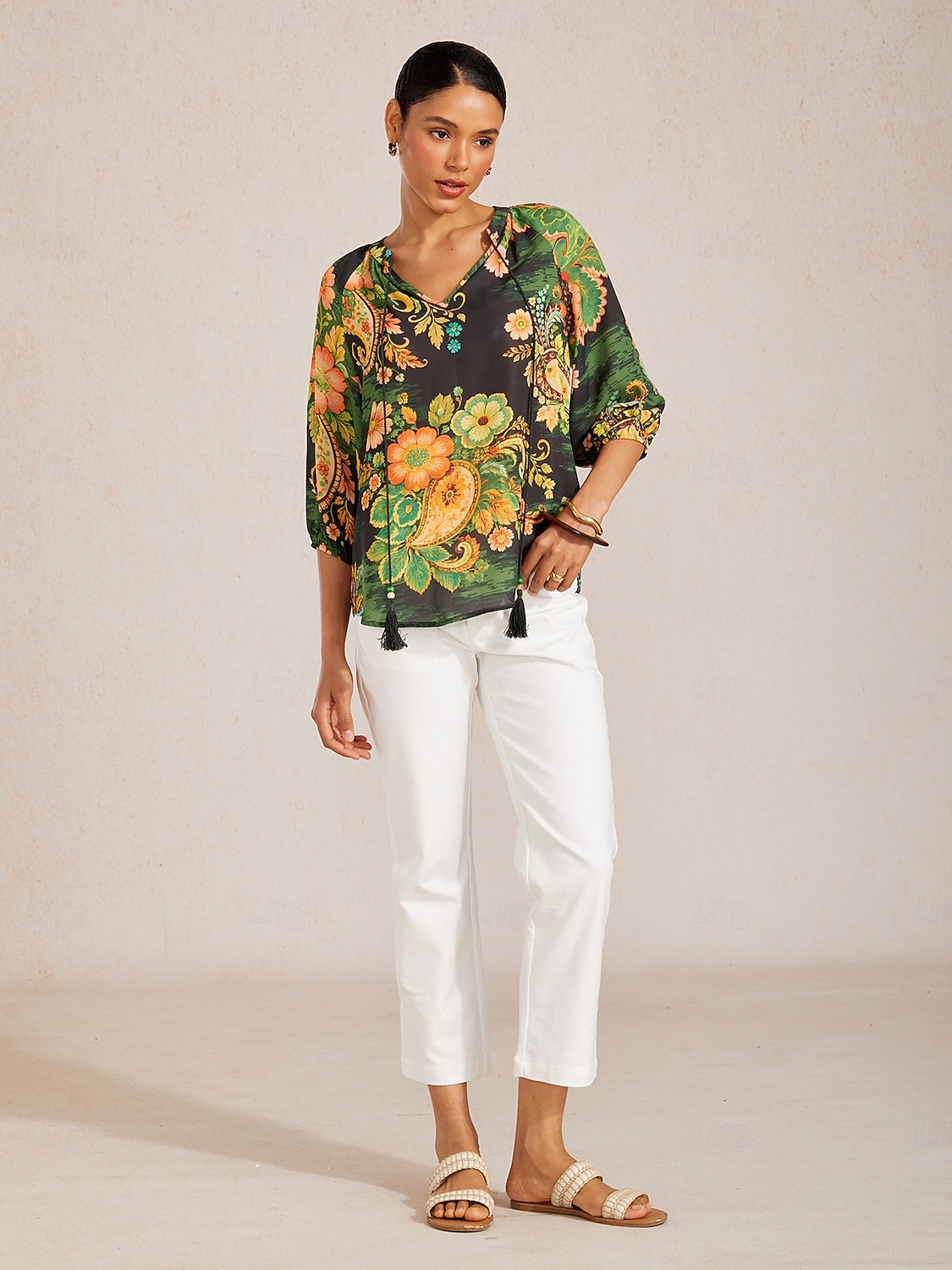Top de gasa fluida con mangas raglán y estampado paisley. 2026 - $67.99 –P6