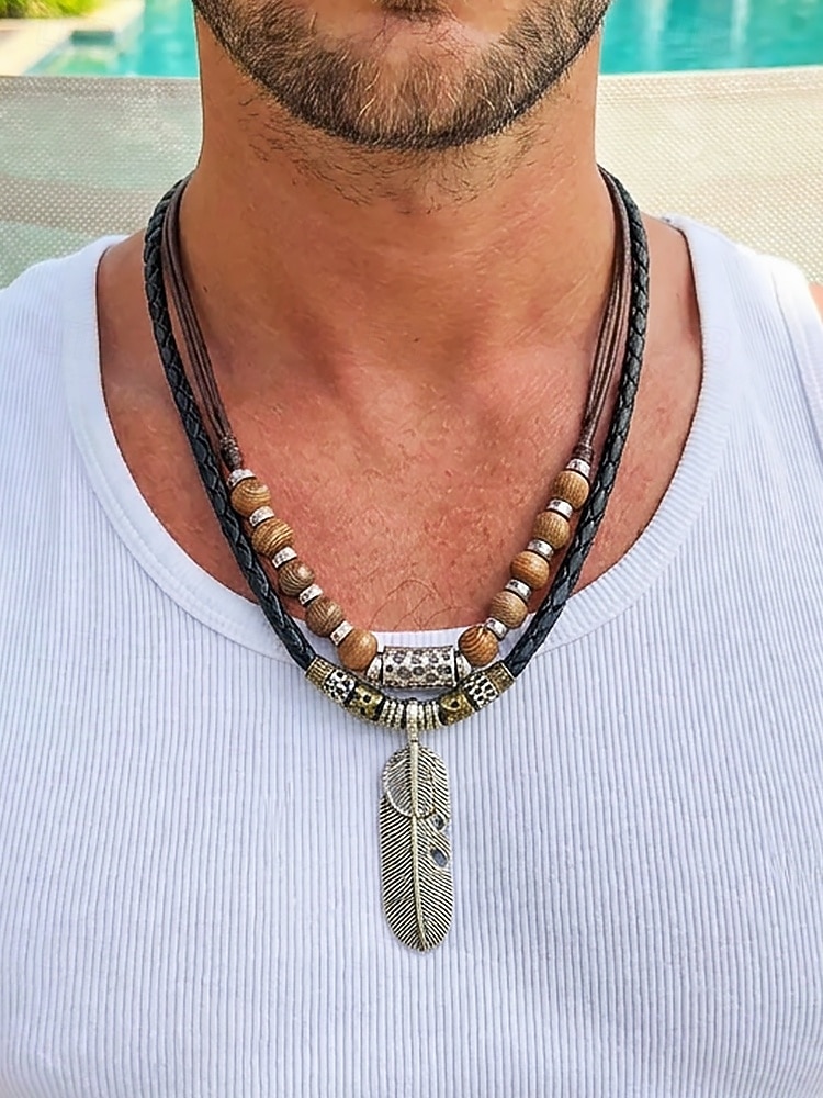 Vintage fjæranhengskjede for menn med turkise perler – tribal stil lærsmykker til festivaler, reiser og hverdagsbruk 2026 - $9.99 –P1