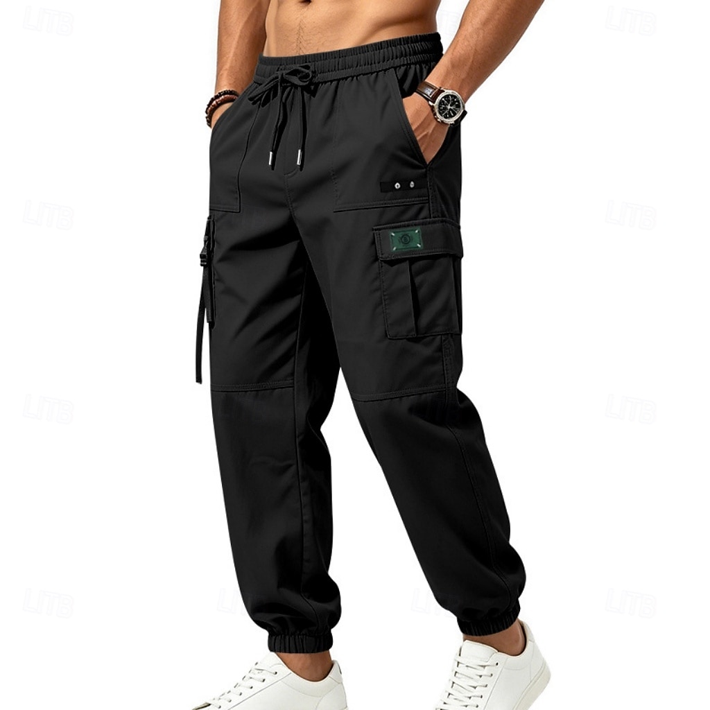 Per uomo Pantaloni Cargo Joggers Pantaloni Coulisse Elastico in vita Multi-tasche Tinta unica Antivento Comodità Quotidiano All'aperto Ferie Streetwear Elegante Cachi Nero Inelastico del 2026 a $29.99 –P12