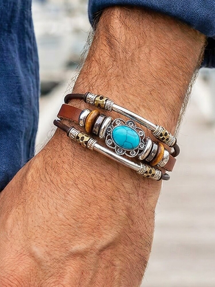Bracelet manchette pour homme en cuir turquoise avec tête de mort et détails métalliques, style bohème western, parfait pour une tenue décontractée au quotidien. de 2026 ? $11.99 –P1