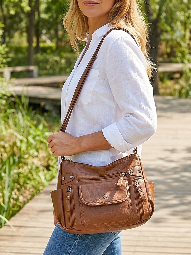 Bolsa transversal feminina em couro sintético, com vários bolsos, bolsa de ombro espaçosa com alça ajustável, bolsa mensageiro vintage macia para viagens, férias e uso casual diário. de 2026 por $18.99 –P1