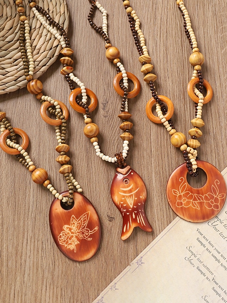 Colar feminino boêmio com pingente de madeira, longo, com contas, estilo statement, com pingente de elefante, peixe e flores. Joia artesanal em madeira, ideal para férias, praia, festivais, viagens e de 2026 por $11.99 –P5