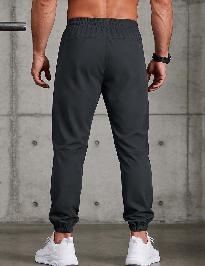 Bărbați Jogger Pantaloni Pantaloni casual Pantaloni cu uscare rapidă Pantaloni de răcire Cordon Buzunar cu Fermoar Manșetă Elastică Simplu Ușor Respirabil Lungime totală Casual Zilnic Alergat Mod 2026 - $8.99 –P4