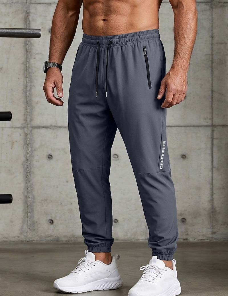 Bărbați Jogger Pantaloni Pantaloni casual Pantaloni cu uscare rapidă Pantaloni de răcire Cordon Buzunar cu Fermoar Manșetă Elastică Simplu Ușor Respirabil Lungime totală Casual Zilnic Alergat Mod 2026 - $8.99 –P2
