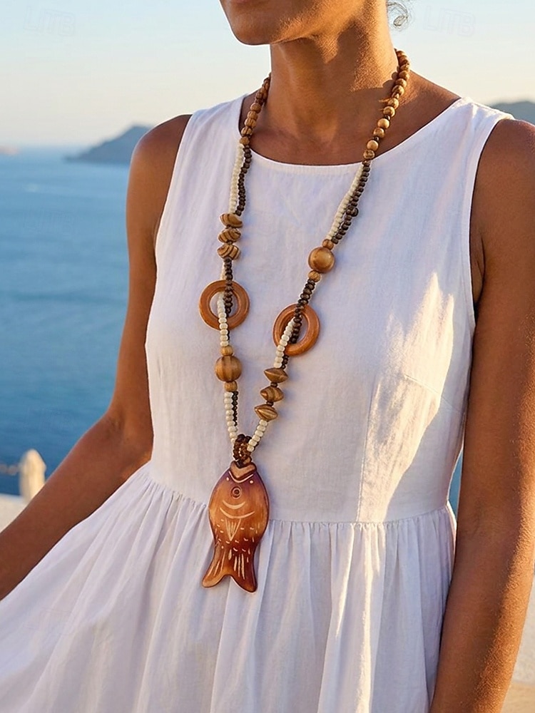 Colar feminino boêmio com pingente de madeira, longo, com contas, estilo statement, com pingente de elefante, peixe e flores. Joia artesanal em madeira, ideal para férias, praia, festivais, viagens e de 2026 por $11.99 –P4