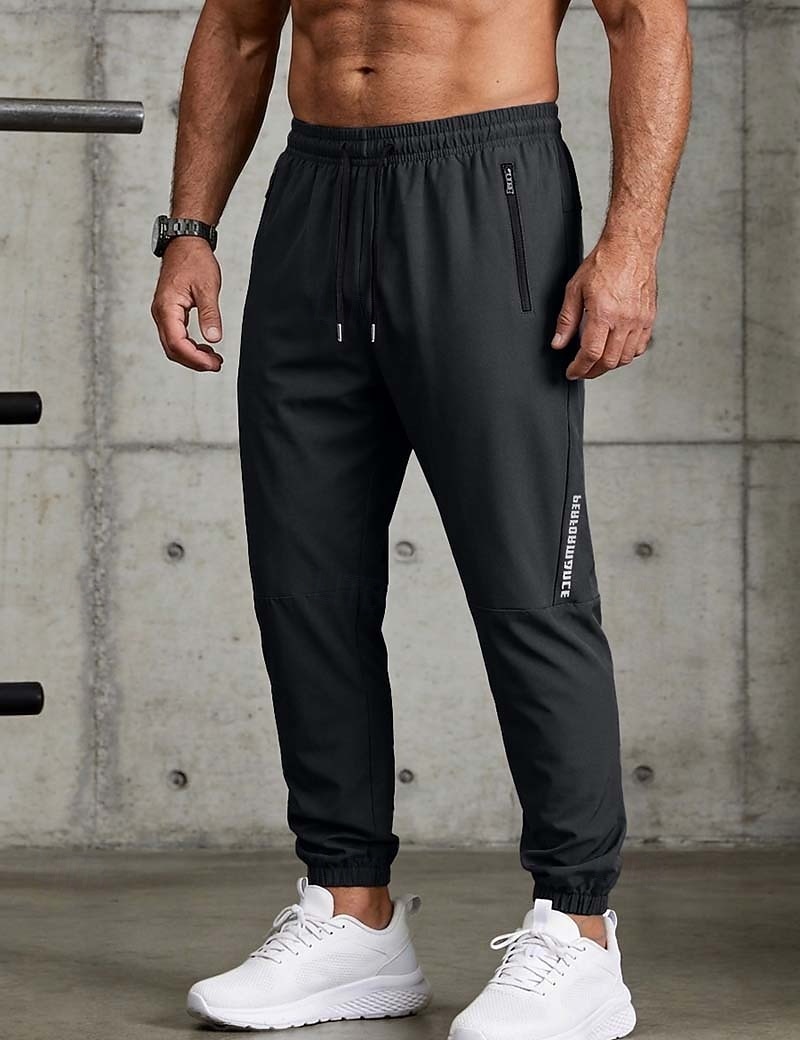 Bărbați Jogger Pantaloni Pantaloni casual Pantaloni cu uscare rapidă Pantaloni de răcire Cordon Buzunar cu Fermoar Manșetă Elastică Simplu Ușor Respirabil Lungime totală Casual Zilnic Alergat Mod 2026 - $8.99 –P3