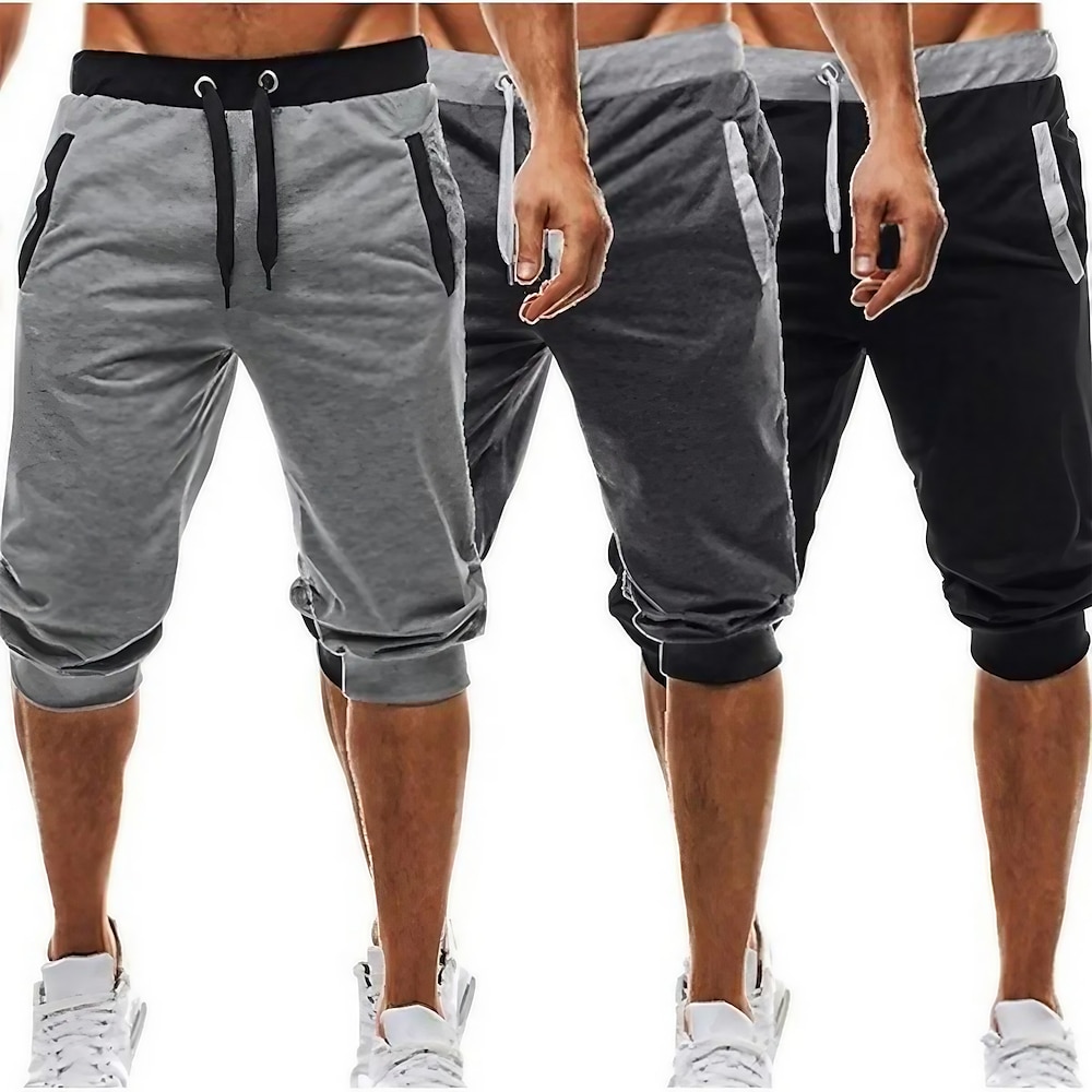 Herren Jogginghose Trainingshose Abgeschnittene Hose Freizeithose Caprihose Patchwork Kordelzug Glatt Täglich Festtage Ausgehen Strassenmode Basic Schwarz Hellgrau Mikro-elastisch Lightinthebox