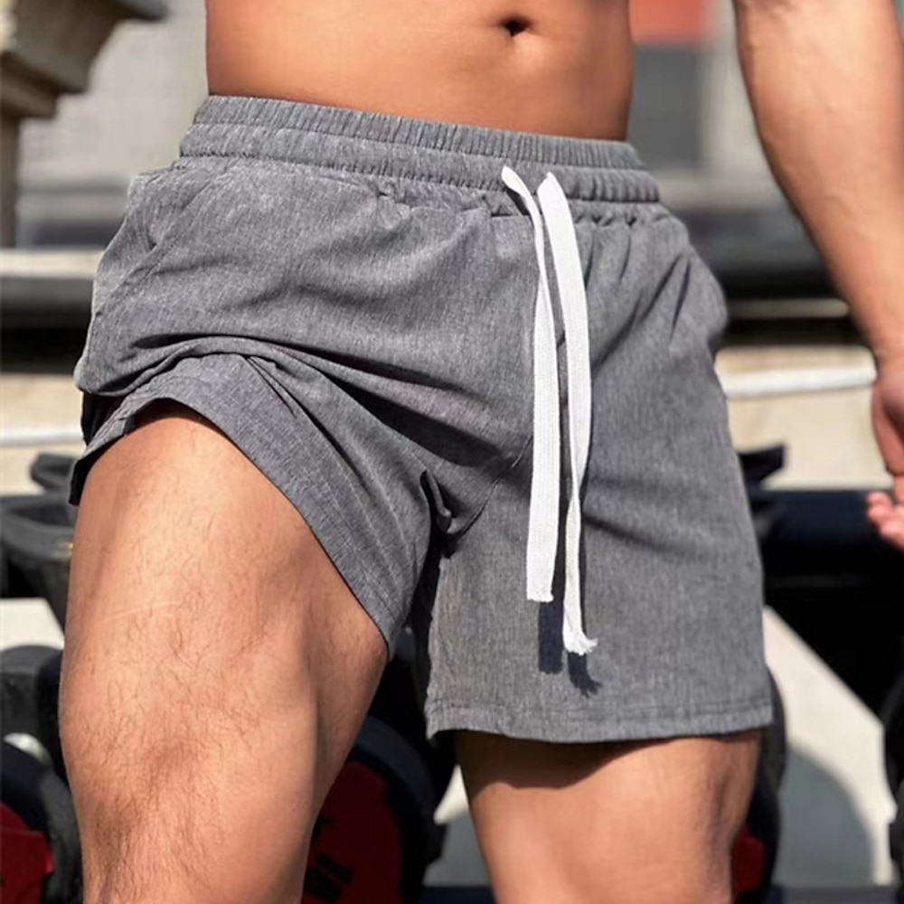 Herren Kurze Sporthose Kurze Sporthose Sport Shorts Ausgehen Wochenende Atmungsaktiv Schnelltrocknend Tasche Kordelzug Elastische Taille Glatt Kurz Gymnastik Brautkleider schlicht Sportkleidung Lightinthebox