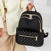 abordables Sacs à Dos de Mode-Sac à dos en nylon matelassé noir pour femme avec fermetures éclair dorées et poche avant cloutée – sac léger et élégant pour l&#039;école, le travail ou un usage quotidien