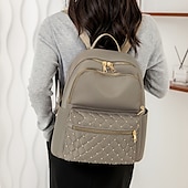 abordables Sacs à Dos de Mode-Sac à dos en nylon matelassé noir pour femme avec fermetures éclair dorées et poche avant cloutée – sac léger et élégant pour l&#039;école, le travail ou un usage quotidien