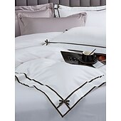 economico Collezione d&#039;elite-Set copripiumino da 4 pezzi, 100% cotone biologico, tessuto morbido e traspirante, include copripiumino e federe per un sonno confortevole.