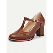 halpa 1950-luku-naisten vintage-ruskeat t-ranneke Mary jane -pumput, joissa on brogue-yksityiskohtia – paksut korkokengät toimistoon, retromuotiin ja arkipäivään