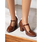 halpa 1950-luku-naisten vintage-ruskeat t-ranneke Mary jane -pumput, joissa on brogue-yksityiskohtia – paksut korkokengät toimistoon, retromuotiin ja arkipäivään