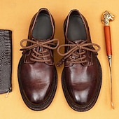 billiga Klassiska Klädskor-Herrloafers i brunt läder med mockasiner, tofsdetalj och Goodyear-randsydda detaljer – bekväma och eleganta skor för både vardagliga och semiformella tillfällen