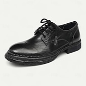 billiga Klassiska Klädskor-Herrloafers i brunt läder med mockasiner, tofsdetalj och Goodyear-randsydda detaljer – bekväma och eleganta skor för både vardagliga och semiformella tillfällen