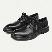 billiga Klassiska Klädskor-Herrloafers i brunt läder med mockasiner, tofsdetalj och Goodyear-randsydda detaljer – bekväma och eleganta skor för både vardagliga och semiformella tillfällen
