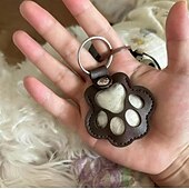 economico I regali-Portachiavi in pelle a forma di zampa di animale domestico, ciondolo creativo per conservare i ricordi dei peli di cane e gatto, grazioso accessorio per la decorazione di borsetta.