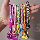 abordables Correas para el teléfono y muñequeras-Nueva cuerda corta para colgar el teléfono móvil con estampado de muñeca, bonita cuerda tejida corta de doble uso, resistente para viajes al aire libre para hombres y mujeres.