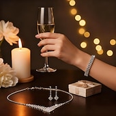 abordables Collar de mujer-Conjunto de joyas de diamantes de imitación de lujo: collar, pulsera y pendientes colgantes de cristal plateado brillante para mujer.