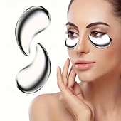 voordelige Huidverzorgingshulpmiddelen-1 paar herbruikbare roestvrijstalen oogmaskers - multifunctioneel ontwerp voor warmte- en koudetherapie, draagbaar en reisvriendelijk, geschikt voor alle huidtinten, in gebroken wit.