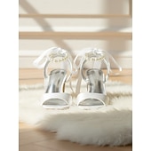 tanie Panna młoda-Damskie fioletowe satynowe szpilki ślubne z perłowym paskiem wokół kostki i kokardką, eleganckie sandały ślubne z odkrytymi palcami dla panien młodych, luksusowe buty na wysokim obcasie do ceremonii